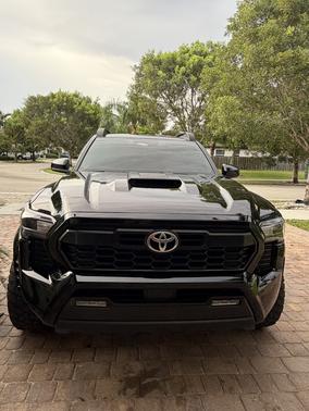 Black 2024 Toyota Tacoma TRD Sport