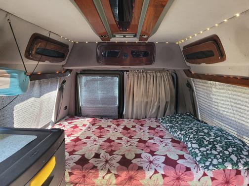 Silver 1999 Ford E150 Base