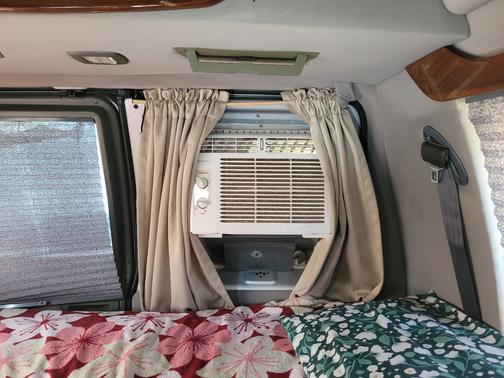 Silver 1999 Ford E150 Base