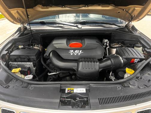 Gold 2014 Jeep Grand Cherokee Overland