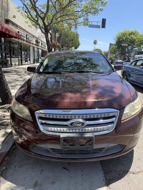 Red 2010 Ford Taurus SEL