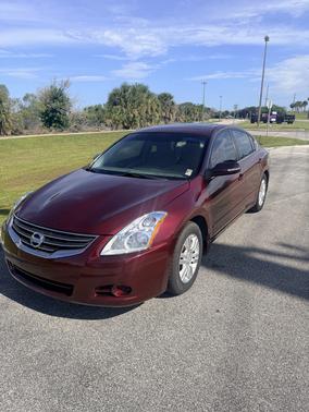 Red 2010 Nissan Altima 2.5 SL