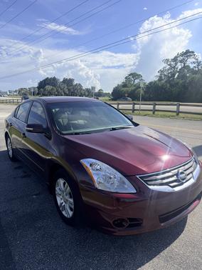 Red 2010 Nissan Altima 2.5 SL