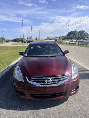 Red 2010 Nissan Altima 2.5 SL