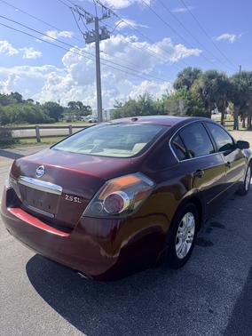 Red 2010 Nissan Altima 2.5 SL