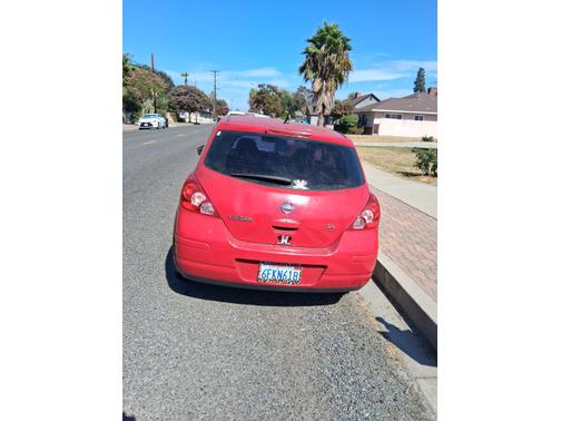 Red 2009 Nissan Versa 1.8 SL