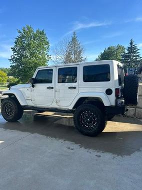 White 2015 Jeep Wrangler Unlimited Sahara