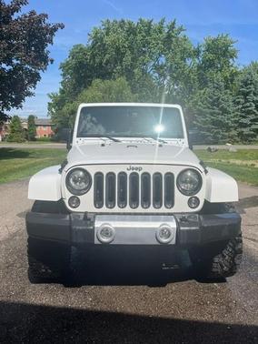 White 2015 Jeep Wrangler Unlimited Sahara