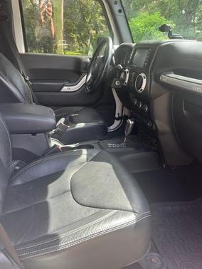 White 2015 Jeep Wrangler Unlimited Sahara