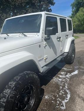 White 2015 Jeep Wrangler Unlimited Sahara