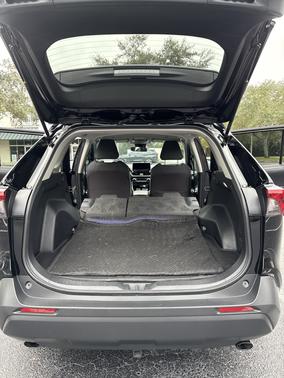 Black 2024 Toyota RAV4 Hybrid Woodland