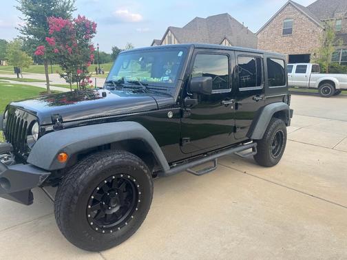 Black 2014 Jeep Wrangler Unlimited Sport