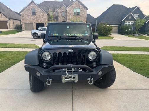 Black 2014 Jeep Wrangler Unlimited Sport