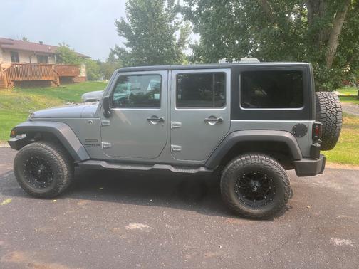 Gray 2013 Jeep Wrangler Unlimited Sport
