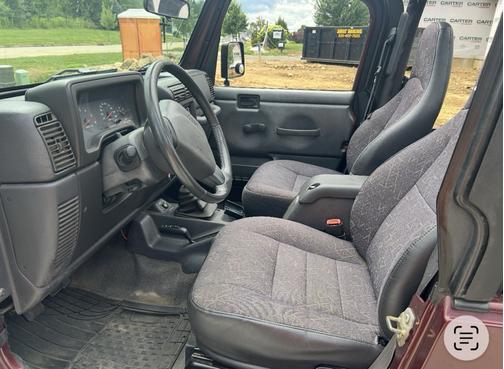 Red 2002 Jeep Wrangler X