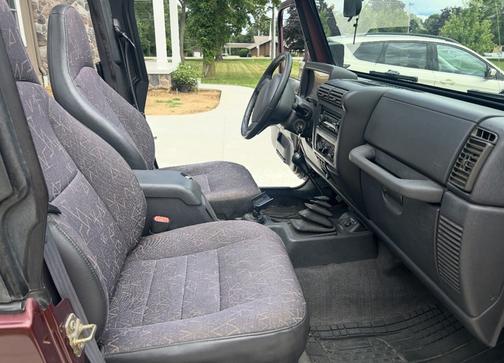 Red 2002 Jeep Wrangler X