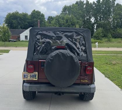 Red 2002 Jeep Wrangler X