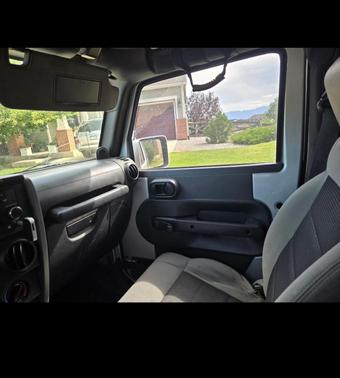 Silver 2010 Jeep Wrangler Sport