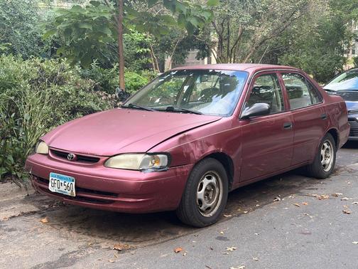 Red 1999 Toyota Corolla LE