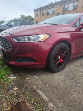 Red 2013 Ford Fusion SE