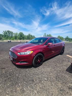 Red 2013 Ford Fusion SE