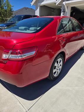 Red 2010 Toyota Camry LE