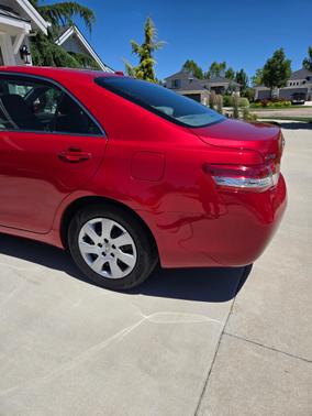 Red 2010 Toyota Camry LE