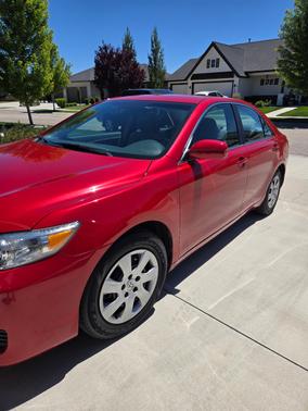 Red 2010 Toyota Camry LE