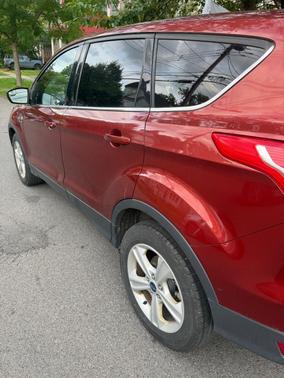 Red 2014 Ford Escape SE
