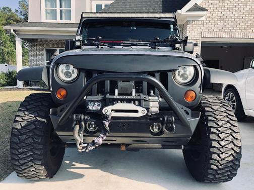 Gray 2013 Jeep Wrangler Unlimited Sport