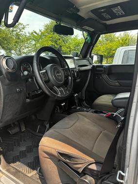 Gray 2013 Jeep Wrangler Unlimited Sport