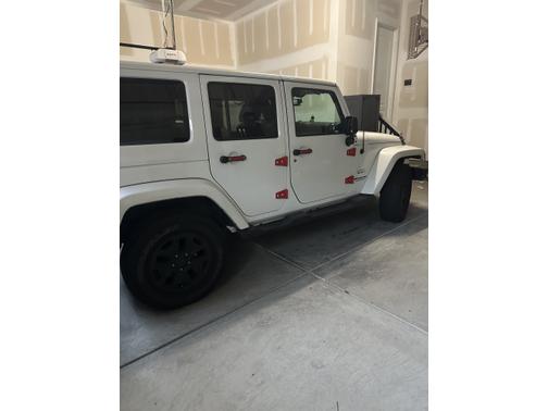 White 2016 Jeep Wrangler Unlimited Sahara