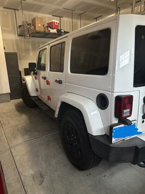 White 2016 Jeep Wrangler Unlimited Sahara