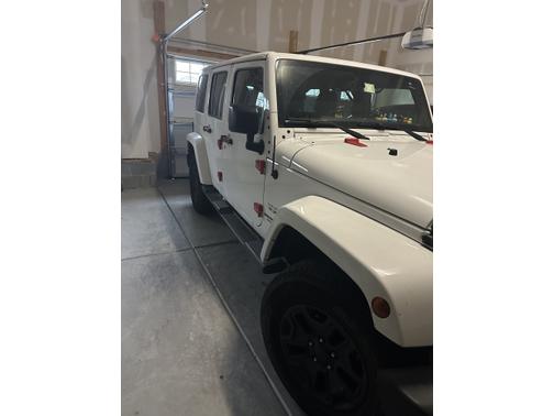 White 2016 Jeep Wrangler Unlimited Sahara