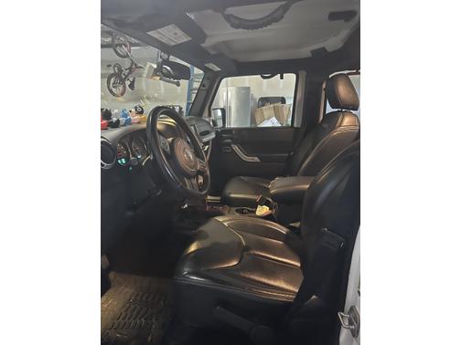 White 2016 Jeep Wrangler Unlimited Sahara