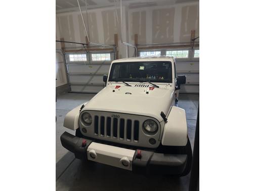 White 2016 Jeep Wrangler Unlimited Sahara
