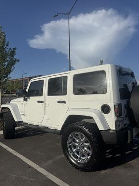 White 2013 Jeep Wrangler Unlimited Sahara