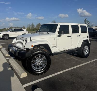 White 2013 Jeep Wrangler Unlimited Sahara