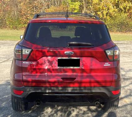 Red 2017 Ford Escape SE