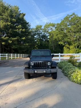 Black 2017 Jeep Wrangler Sport
