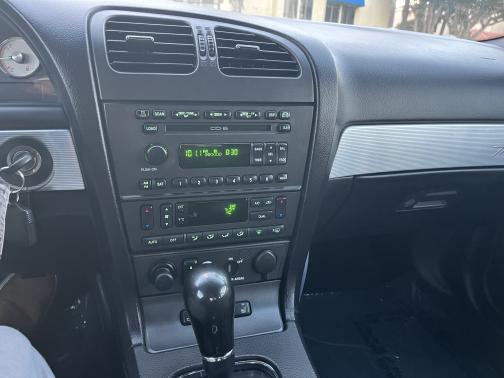 Red 2004 Ford Thunderbird Deluxe
