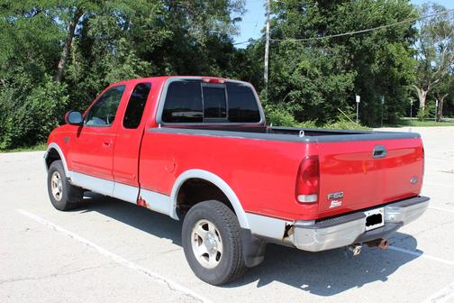 Red 1999 Ford F-150 Lariat SuperCab