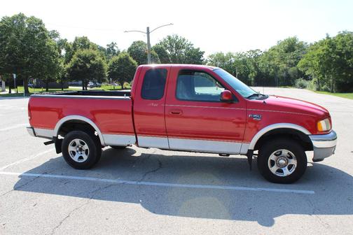 Red 1999 Ford F-150 Lariat SuperCab