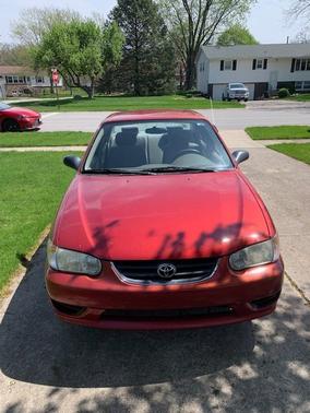 Red 2002 Toyota Corolla CE