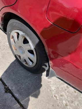 Red 2002 Toyota Corolla CE