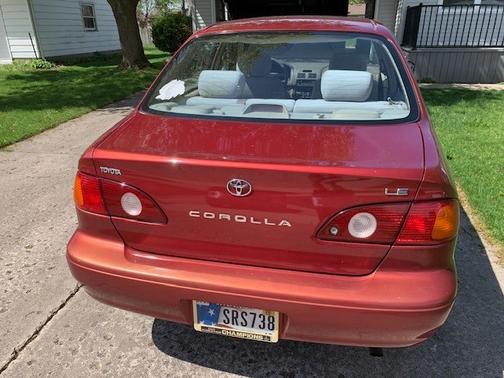 Red 2002 Toyota Corolla CE