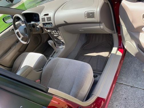 Red 2002 Toyota Corolla CE