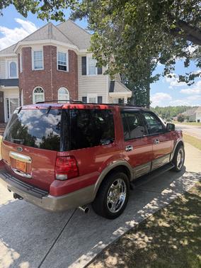 Red 2003 Ford Expedition Eddie Bauer