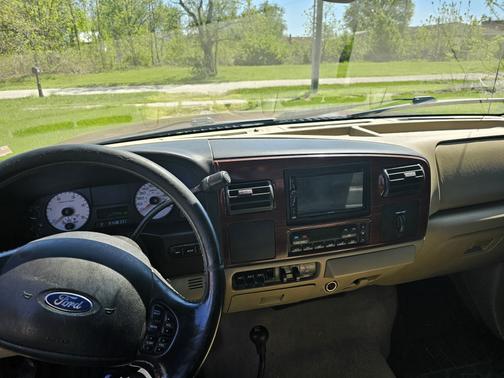 Red 2005 Ford F-350 Lariat Crew Cab Super Duty