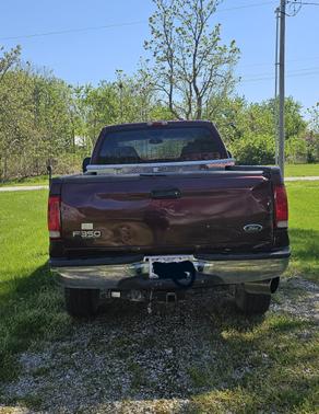 Red 2005 Ford F-350 Lariat Crew Cab Super Duty